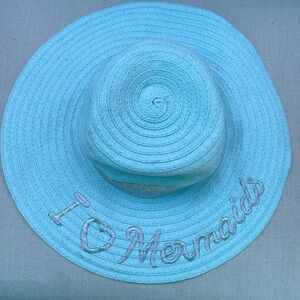 Very cute I love mermaids, straw hat, and aqua very lightweight silver band trim